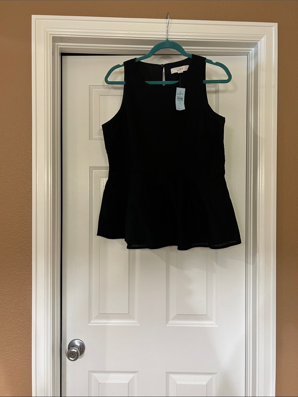 LOFT Black Sleeveless Peplum Top